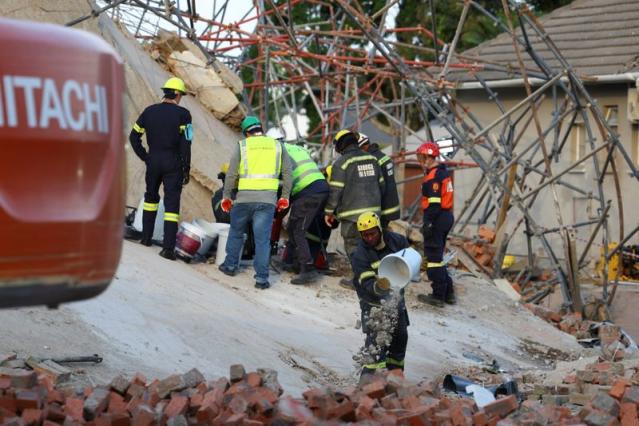 Deadly building collapse leaves dozens trapped